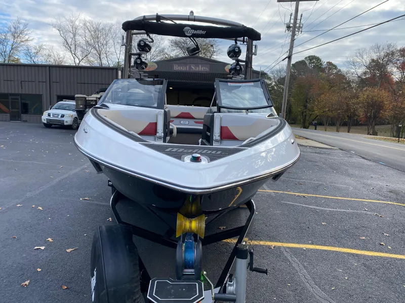 Slide: The Image of 2016 Malibu Wakesetter 23 LSV boat on trailer in parking lot. - 2
