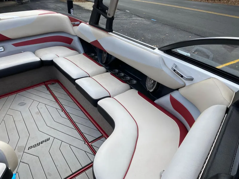Slide: The Image of 2016 Malibu Wakesetter 23 LSV interior with white and red seating. - 27