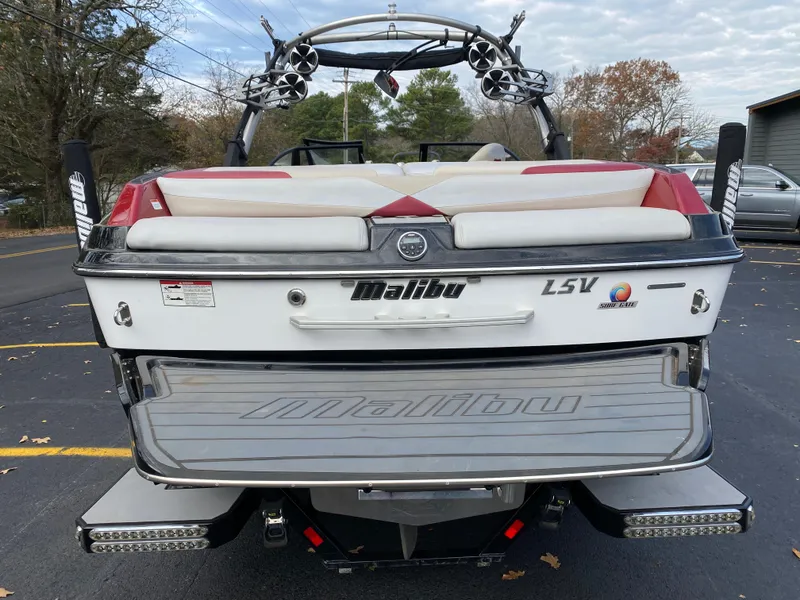 Slide: The Image of 2016 Malibu Wakesetter 23 LSV boat, rear view with wakeboard tower and speakers. - 7