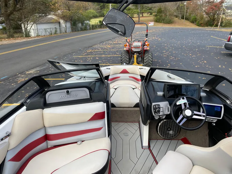 Slide: The Image of Interior of 2016 Malibu Wakesetter 23 LSV boat with modern dashboard and seating. - 9