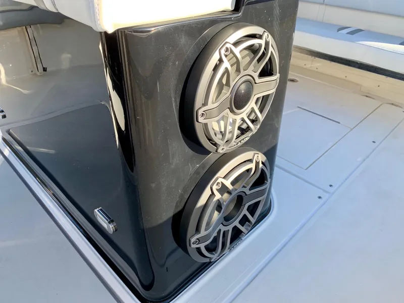Slide: The Image of 2024 ShearWater 270 SS Carolina boat speakers on sleek black panel. - 5