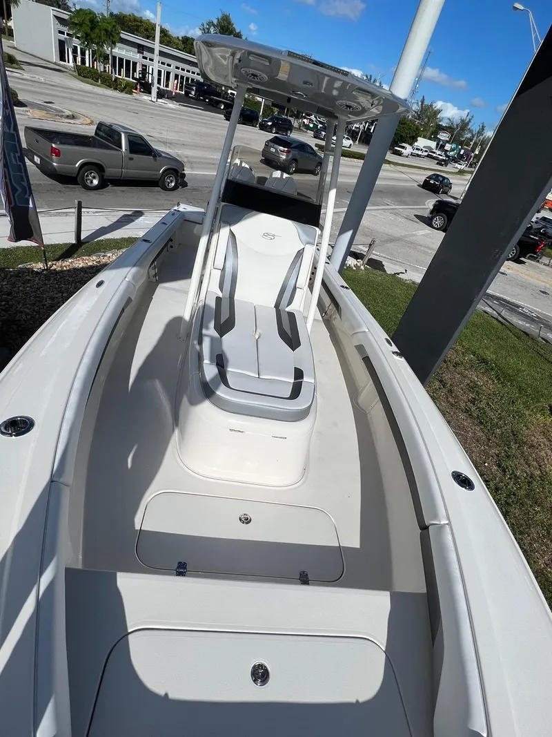 Slide: The Image of 2024 ShearWater 270 SS Carolina boat, sleek design, outdoor display. - 7
