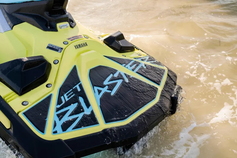 Slide: The Image of 2025 Waverunner JETBLASTER PRO 3UP on water, showcasing vibrant design and branding. - 16