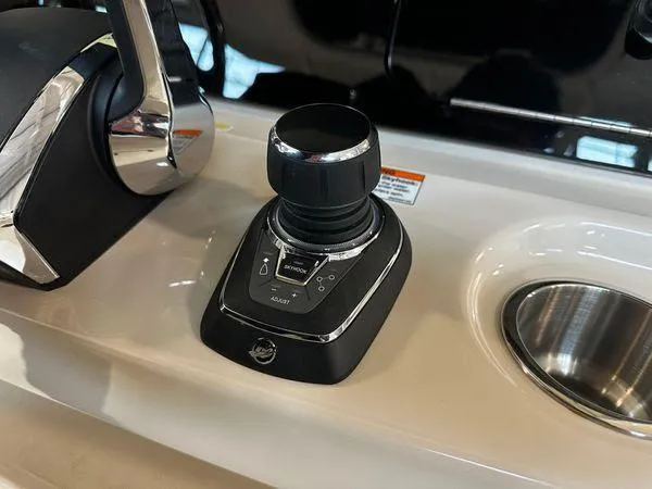 Slide: The Image of Joystick control on 2022 Boston Whaler 330 Outrage boat console. - 16
