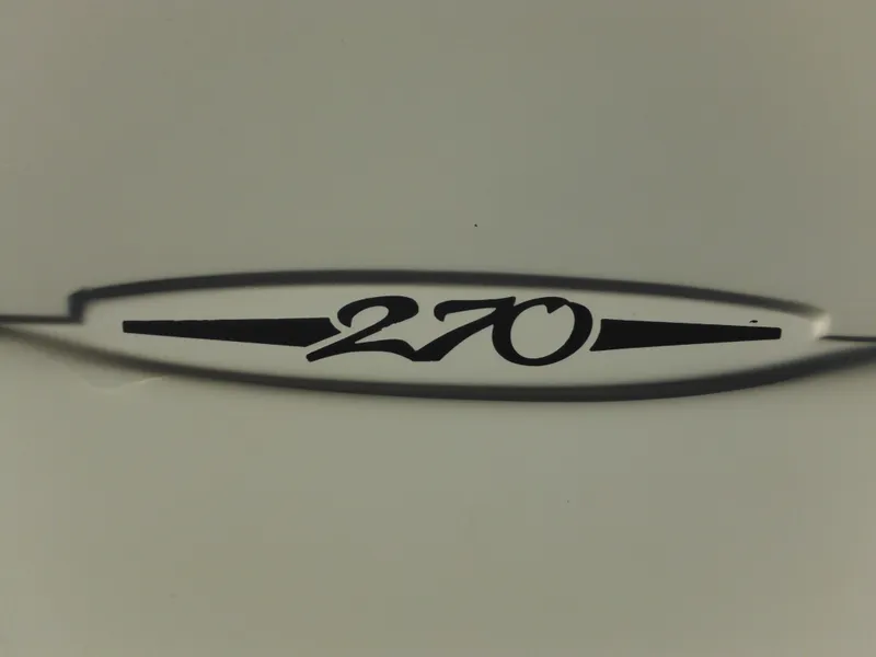 Slide: The Image of Sea Ray 270 Sundancer 1988 emblem on boat hull. - 24