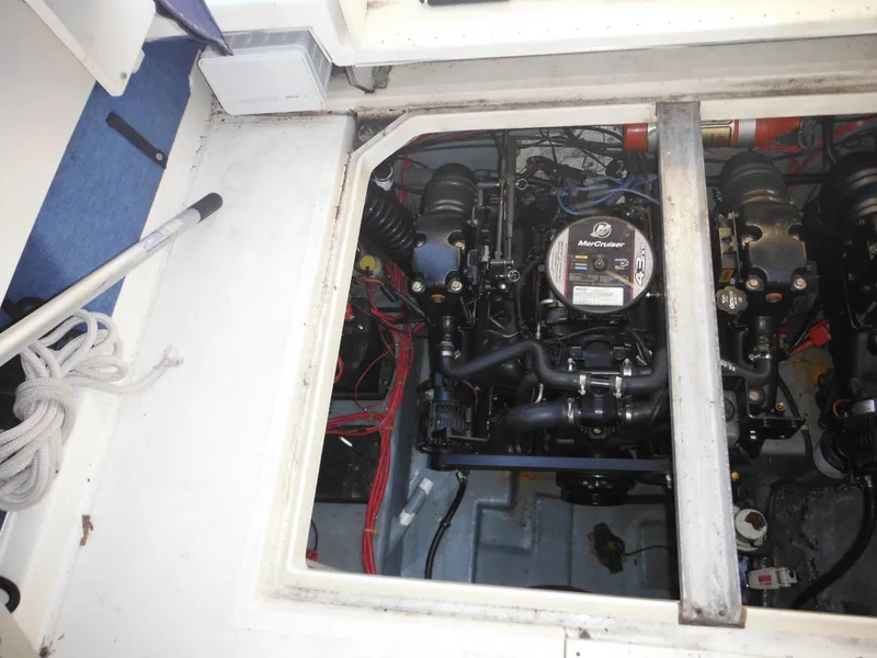 Slide: The Image of Engine compartment of 1988 Sea Ray 270 Sundancer boat, featuring MerCruiser engine. - 30