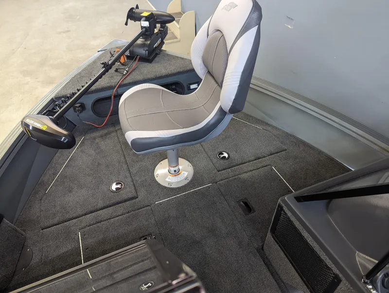 Slide: The Image of 2023 Starcraft Storm 166 DC Pro boat interior with swivel seat and trolling motor. - 5
