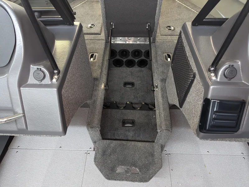 Slide: The Image of 2023 Starcraft Storm 166 DC Pro boat interior with storage compartments. - 6