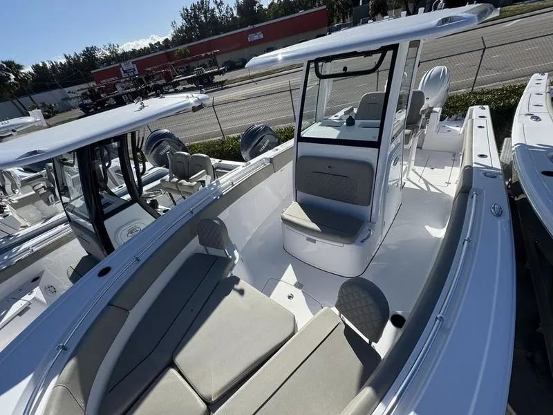 Slide: The Image of 2025 Sportsman Open 252 boat with spacious seating and modern design. - 10