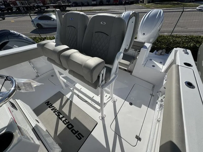 Slide: The Image of 2025 Sportsman Open 252 boat interior with dual seats and console. - 21