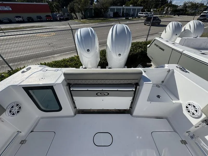 Slide: The Image of 2025 Sportsman Open 252 boat with dual engines, spacious deck, and modern design. - 23
