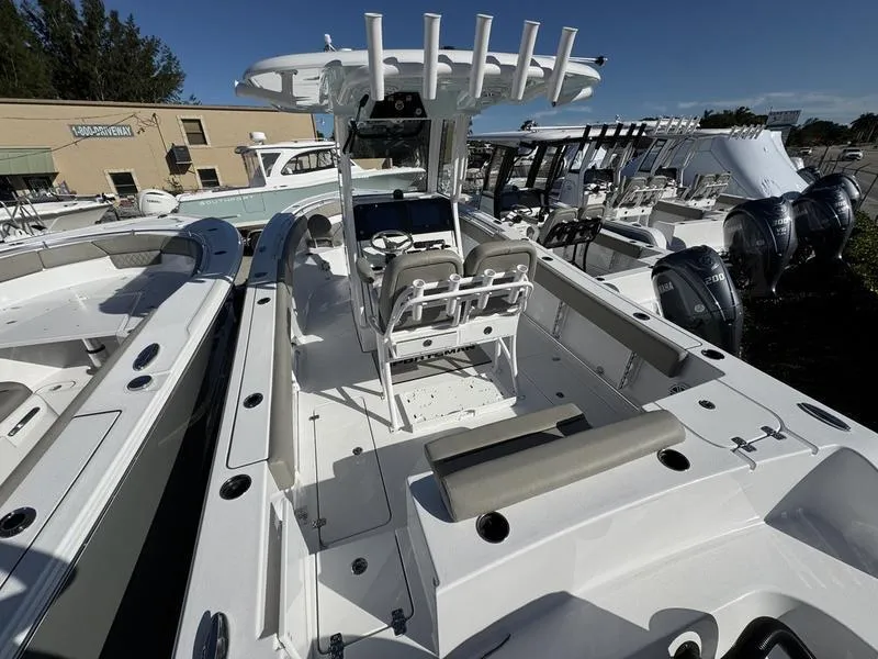 Slide: The Image of 2025 Sportsman Open 252 boat, sleek design, spacious deck, modern features. - 3