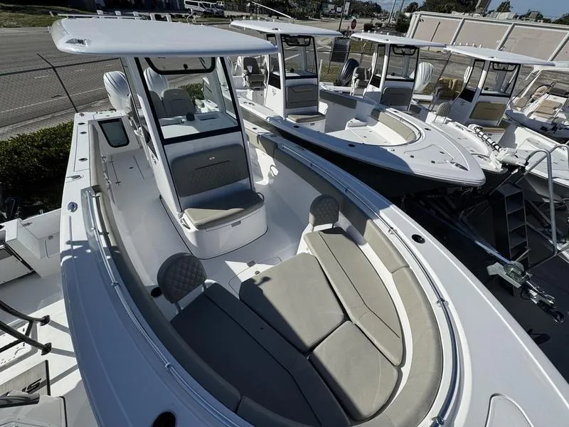 Slide: The Image of 2025 Sportsman Open 252 boat with spacious seating and modern design. - 9