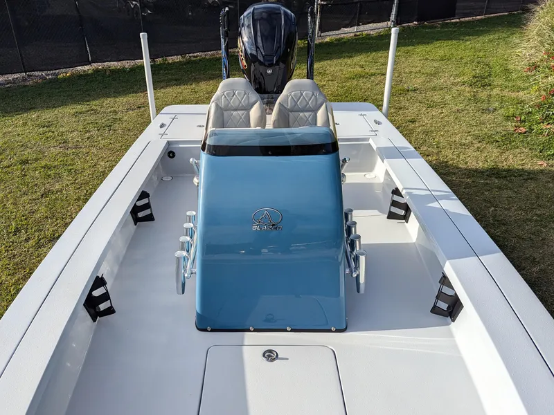 Slide: The Image of 2024 Blazer 675 Ultimate Bay boat with dual seats and sleek design. - 15