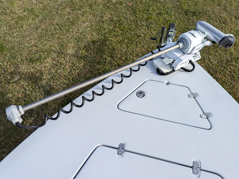 Slide: The Image of 2024 Blazer 675 Ultimate Bay boat deck with trolling motor. - 9