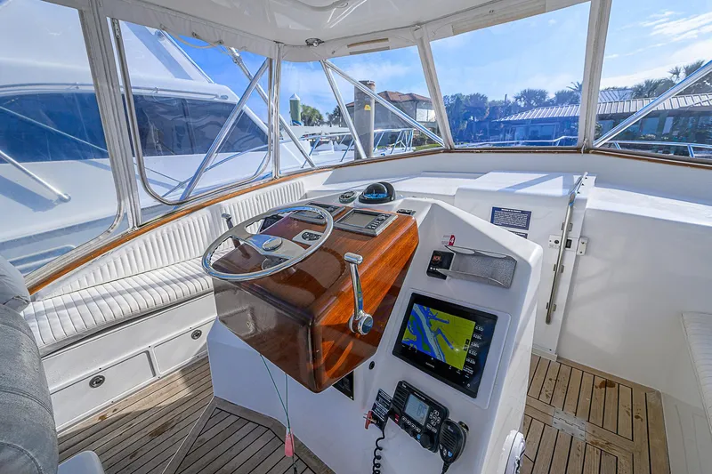 Slide: The Image of 2008 Jersey Cape Devil 36 helm with navigation equipment and panoramic windows. - 15