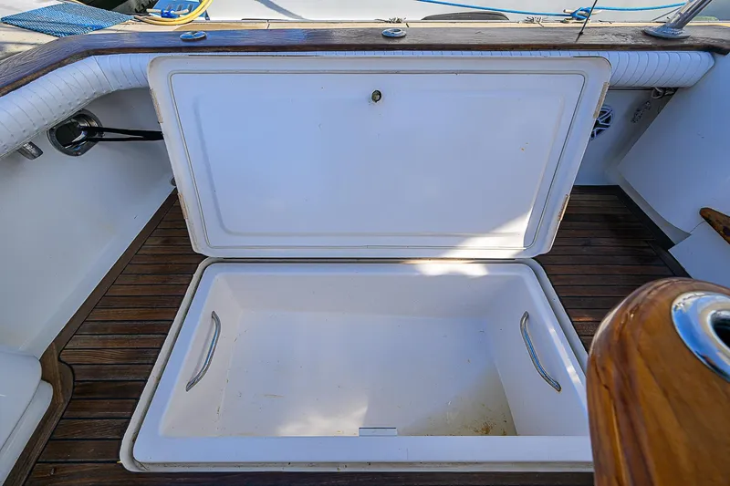 Slide: The Image of Open storage compartment on 2008 Jersey Cape Devil 36 boat deck. - 23