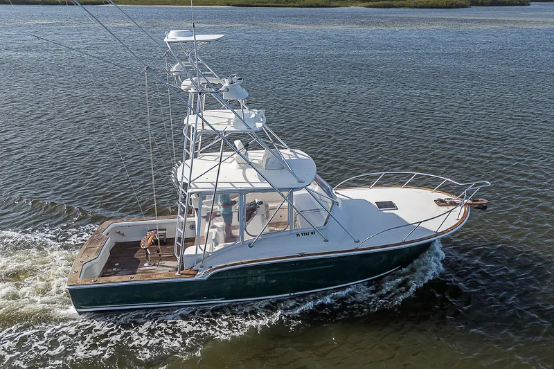 Slide: The Image of 2008 Jersey Cape Devil 36 boat cruising on open water. - 3