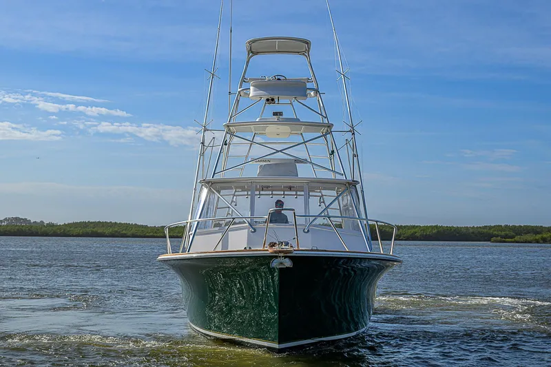 Slide: The Image of 2008 Jersey Cape Devil 36 boat on water, front view, clear sky. - 5