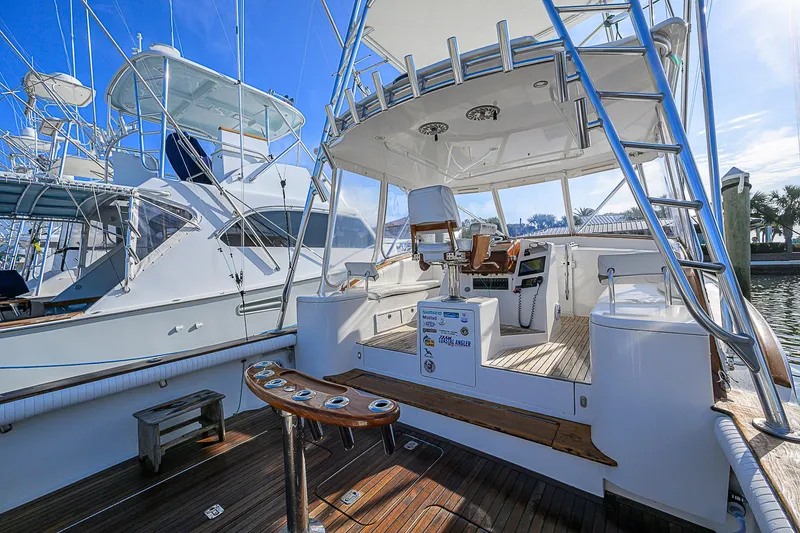 Slide: The Image of 2008 Jersey Cape Devil 36 yacht with spacious deck and fishing equipment. - 8