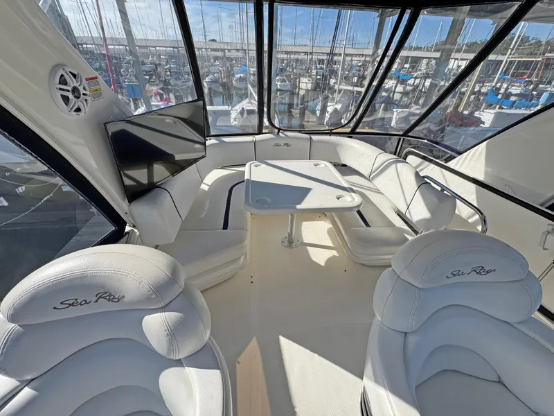 Slide: The Image of Luxurious 2007 Sea Ray 44 Sedan Bridge interior with plush seating and panoramic views. - 19