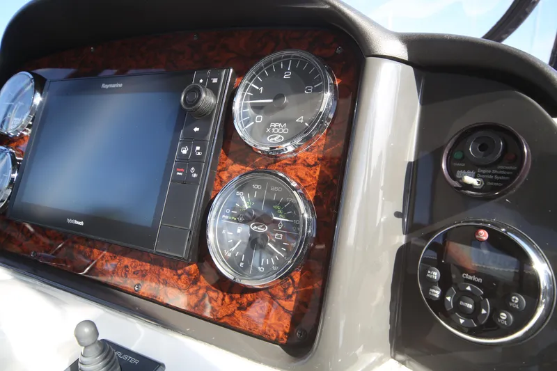 Slide: The Image of Dashboard of 2007 Sea Ray 44 Sedan Bridge with navigation and control instruments. - 29