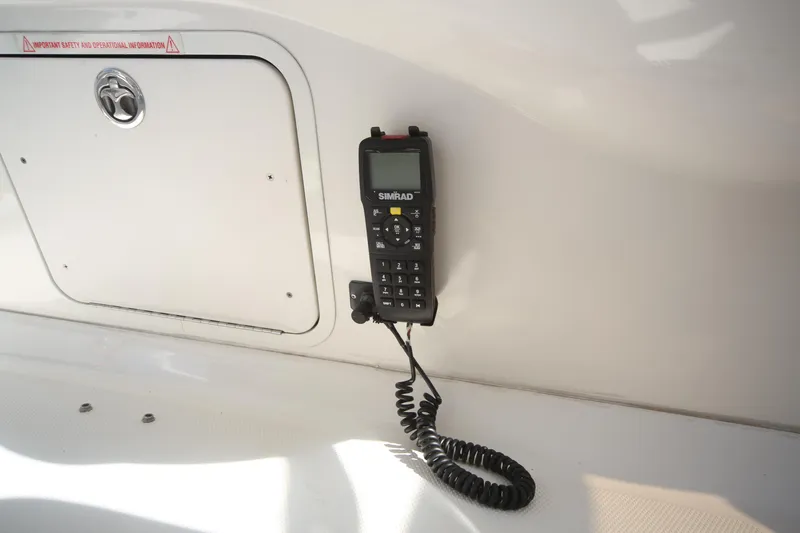 Slide: The Image of VHF radio on 2007 Sea Ray 44 Sedan Bridge yacht interior. - 33