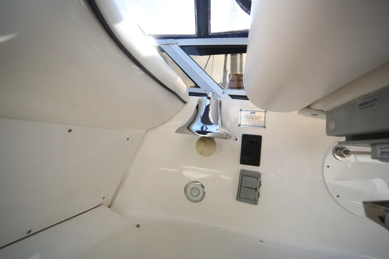 Slide: The Image of Interior view of 2007 Sea Ray 44 Sedan Bridge yacht with bell and control panel. - 34
