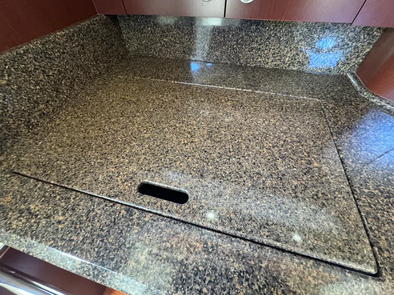 Slide: The Image of Granite countertop in 2007 Sea Ray 44 Sedan Bridge yacht kitchen. - 42