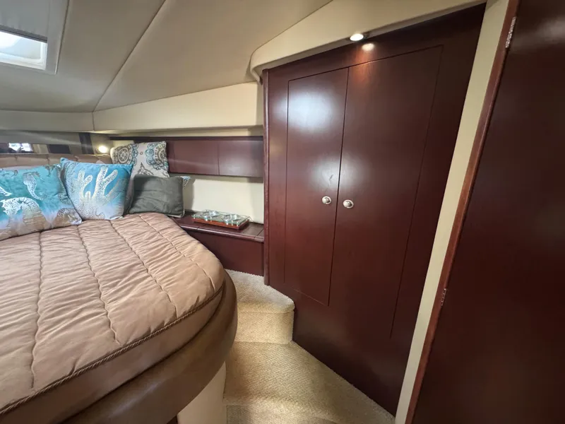 Slide: The Image of Luxurious cabin interior of 2007 Sea Ray 44 Sedan Bridge yacht with elegant wood finishes. - 45