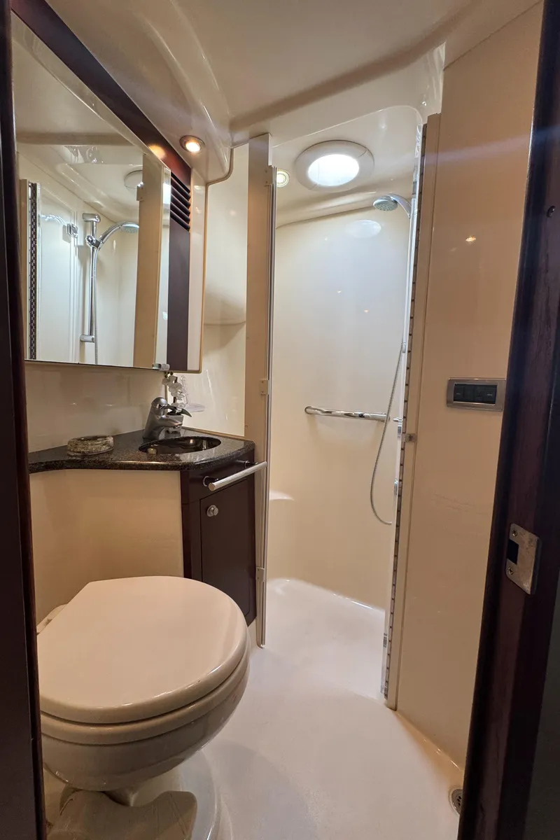 Slide: The Image of Luxurious bathroom in 2007 Sea Ray 44 Sedan Bridge yacht with modern fixtures. - 47