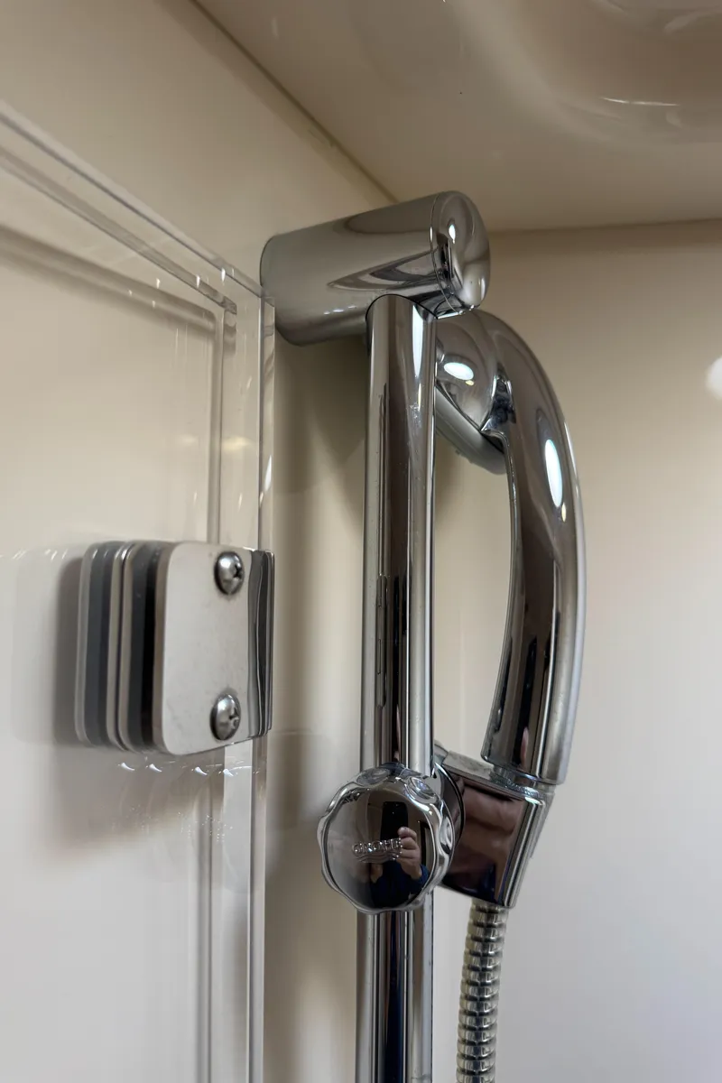 Slide: The Image of Chrome shower fixture in 2007 Sea Ray 44 Sedan Bridge yacht bathroom. - 53
