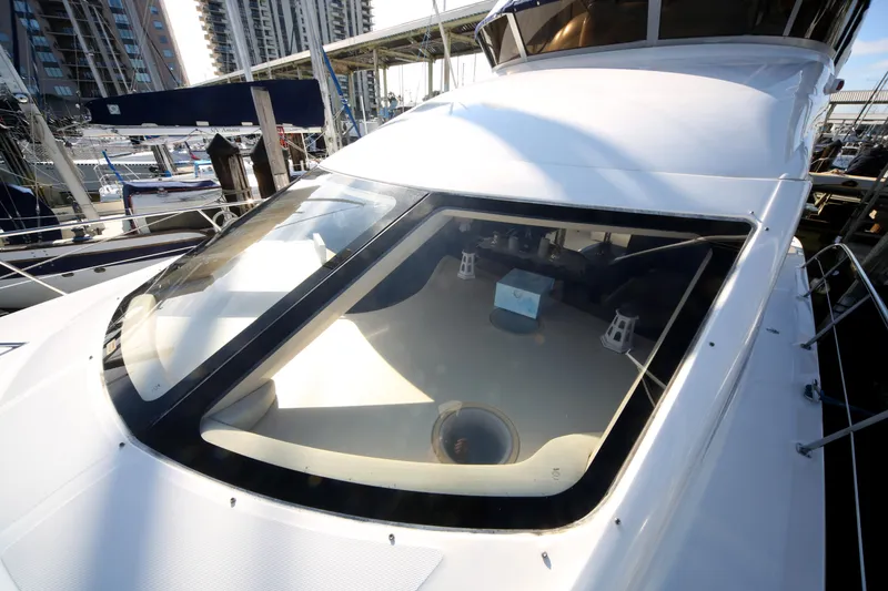 Slide: The Image of 2007 Sea Ray 44 Sedan Bridge yacht docked at marina. - 6