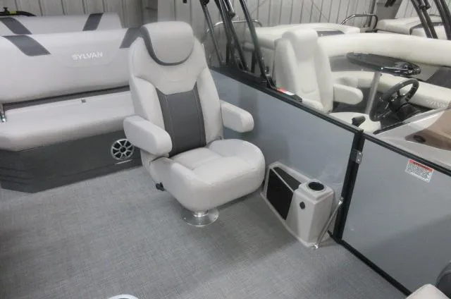 Slide: The Image of 2025 Sylvan L3 DLZ boat interior with plush seating and modern design. - 3