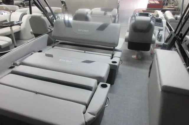 Slide: The Image of 2025 Sylvan L3 DLZ boat interior with gray seating and modern helm. - 9