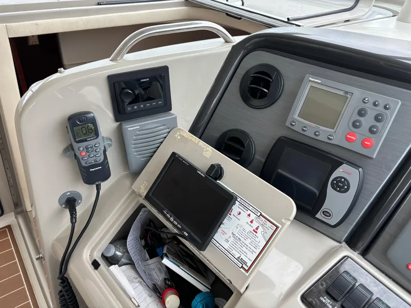 Slide: The Image of Control panel of a 2006 Sea Ray 40 Motor Yacht with navigation equipment. - 10