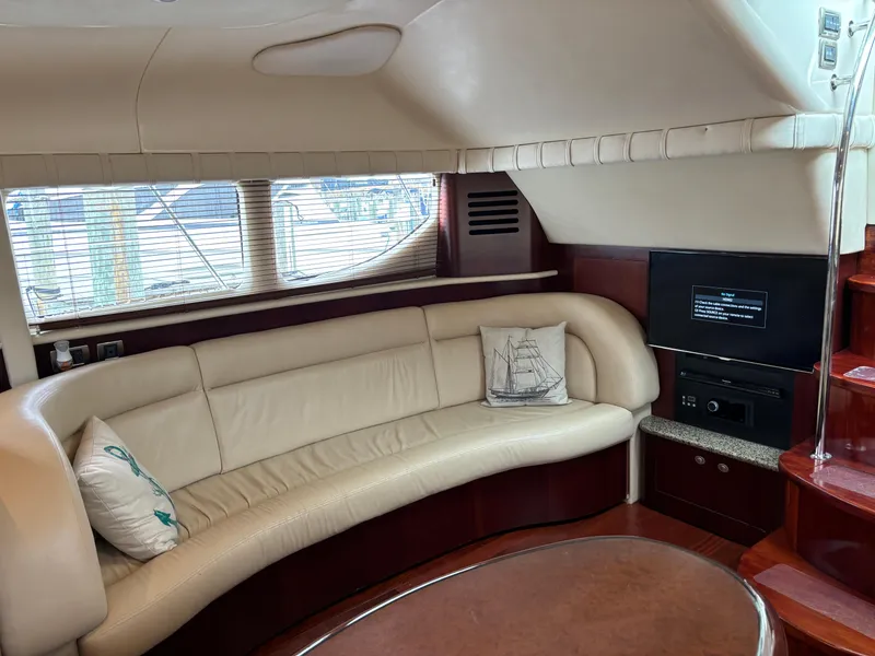 Slide: The Image of Luxurious interior of 2006 Sea Ray 40 Motor Yacht with cream leather seating. - 18