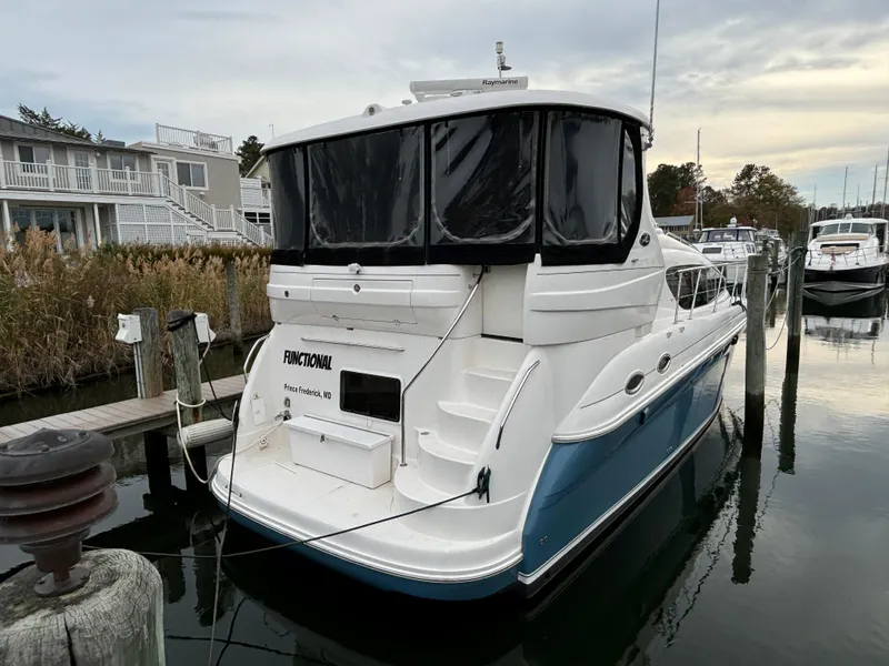 Slide: The Image of 2006 Sea Ray 40 Motor Yacht docked at marina, rear view. - 2
