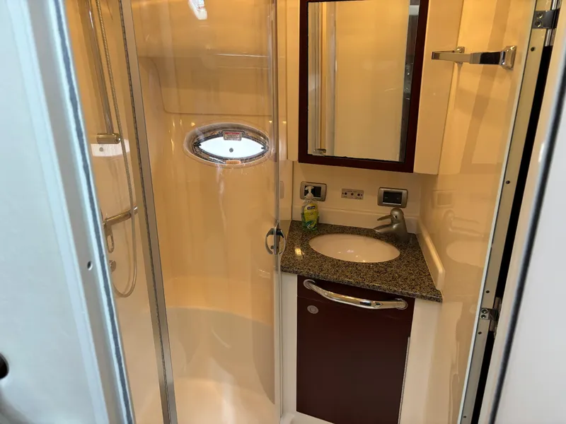 Slide: The Image of Luxurious bathroom in 2006 Sea Ray 40 Motor Yacht with shower and vanity. - 25