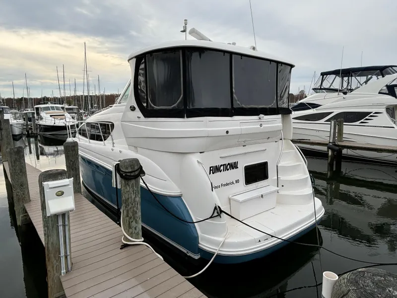 Slide: The Image of 2006 Sea Ray 40 Motor Yacht docked at marina, rear view. - 3
