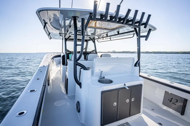 Slide: The Image of 2024 Yellowfin 42 boat on water, featuring sleek design and spacious deck. - 43