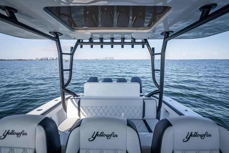 Slide: The Image of 2024 Yellowfin 42 boat interior with ocean view and city skyline. - 46