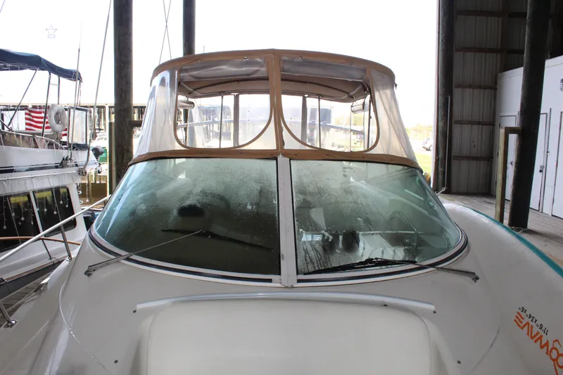 Slide: The Image of 2004 Carver 360 Mariner yacht docked in a marina, front view. - 8