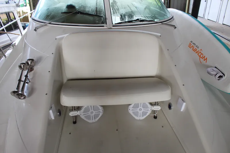Slide: The Image of 2004 Carver 360 Mariner boat with white seating and speakers on deck. - 34