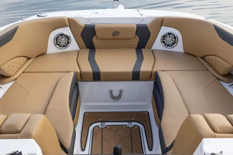 Slide: The Image of 2025 Hurricane SunDeck 2600 OB boat displayed at an indoor exhibition. - 9