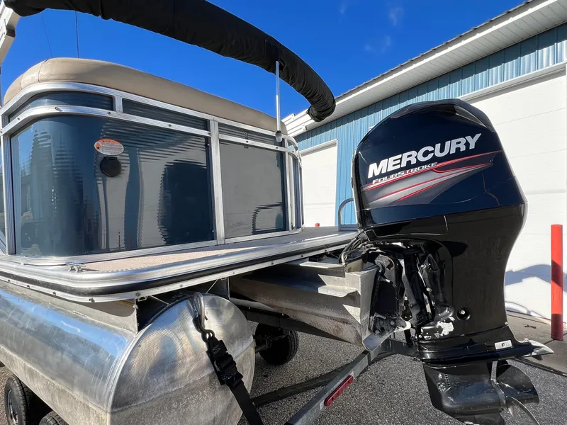 Slide: The Image of 2013 Harris FloteBote Cruiser pontoon boat with Mercury outboard motor. - 10