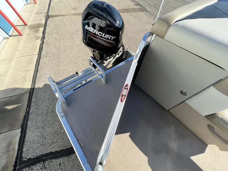 Slide: The Image of 2013 Harris FloteBote Cruiser with Mercury outboard motor and swim platform. - 16