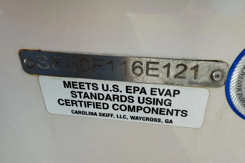 Slide: The Image of 2021 Sea Chaser 26LX compliance plate, meets U.S. EPA standards, Carolina Skiff, Waycross, GA. - 43