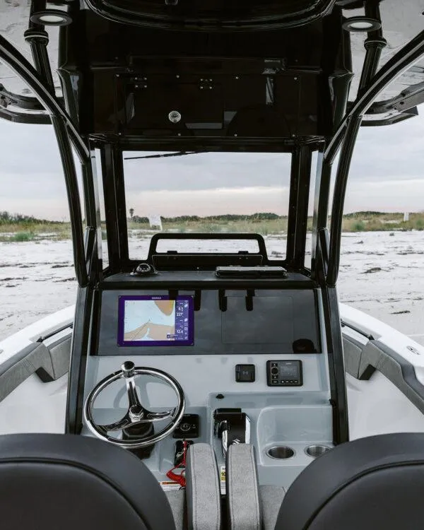 Slide: The Image of Interior view of 2025 Sea Pro 245 FLX boat cockpit with modern controls. - 4