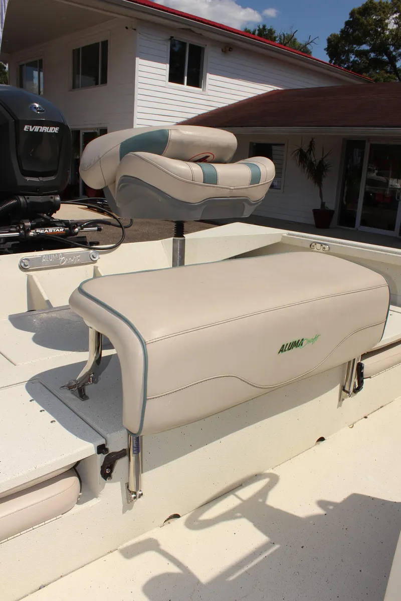 Slide: The Image of 2020 Alumacraft 20 Coastal Bay boat interior with cushioned seating. - 20